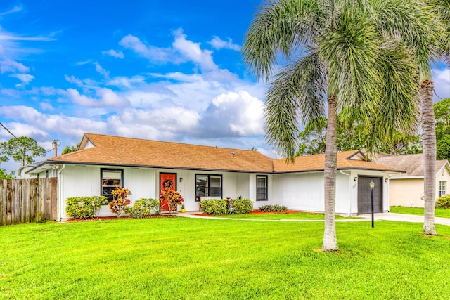 782 NW Kilpatrick Ave, Port Saint Lucie, FL 34983 - ranch-style house featuring an attached garage and driveway