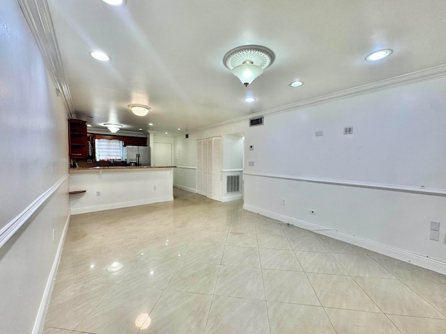 6074 Forest Hill Blvd Unit 107, West Palm Beach, FL 33415 - unfurnished living room featuring ornamental molding, light tile patterned floors, recessed lighting, and baseboards
