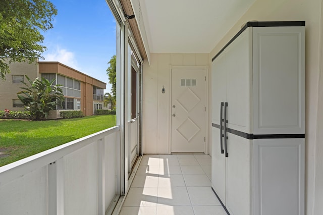 213 Piedmont E, Delray Beach, FL 33484 - doorway featuring light tile patterned floors