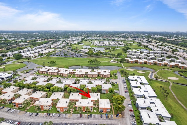 213 Piedmont E, Delray Beach, FL 33484 - aerial view of property's location with a golf course, a nearby body of water, and nearby suburban area