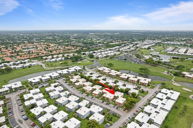 213 Piedmont E, Delray Beach, FL 33484 - aerial view of property and surrounding area with a golf course, a nearby body of water, and nearby suburban area