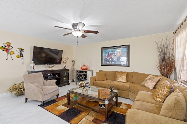 213 Piedmont E, Delray Beach, FL 33484 - living area with a ceiling fan and light marble finish flooring