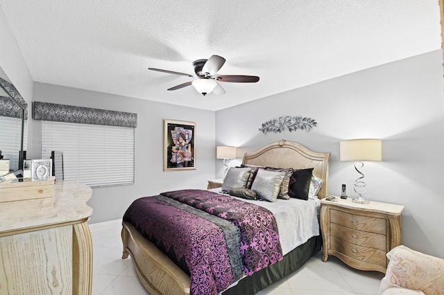 213 Piedmont E, Delray Beach, FL 33484 - tiled bedroom featuring ceiling fan