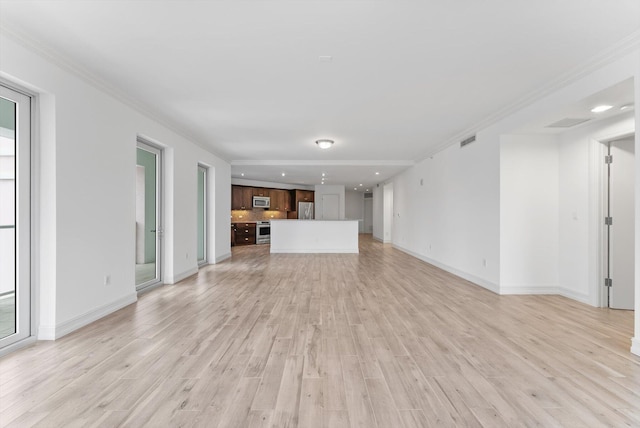 455 E Palmetto Park Rd Unit 3E, Boca Raton, FL 33432 - unfurnished living room featuring light wood-type flooring, baseboards, crown molding, and recessed lighting