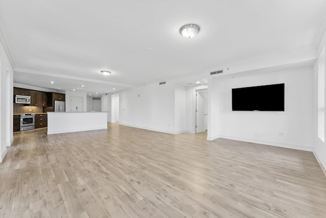 455 E Palmetto Park Rd Unit 3E, Boca Raton, FL 33432 - unfurnished living room with crown molding, recessed lighting, light wood finished floors, and baseboards