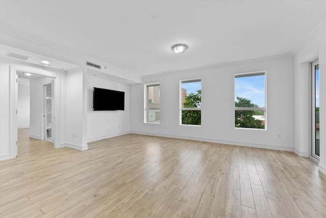 455 E Palmetto Park Rd Unit 3E, Boca Raton, FL 33432 - unfurnished living room featuring crown molding, light wood-style floors, and baseboards