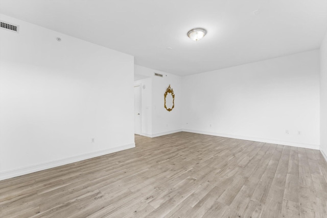455 E Palmetto Park Rd Unit 3E, Boca Raton, FL 33432 - empty room featuring light wood-style flooring and baseboards