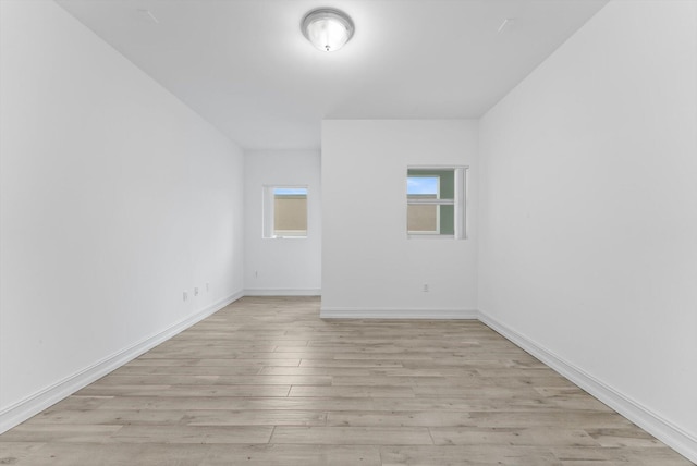 455 E Palmetto Park Rd Unit 3E, Boca Raton, FL 33432 - spare room with light wood finished floors and baseboards