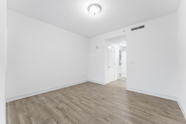 455 E Palmetto Park Rd Unit 3E, Boca Raton, FL 33432 - unfurnished room featuring light wood-type flooring and baseboards