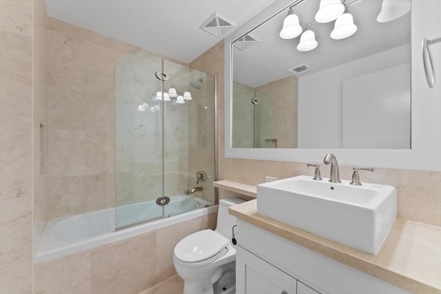 455 E Palmetto Park Rd Unit 3E, Boca Raton, FL 33432 - bathroom with tiled shower / bath, vanity, and toilet