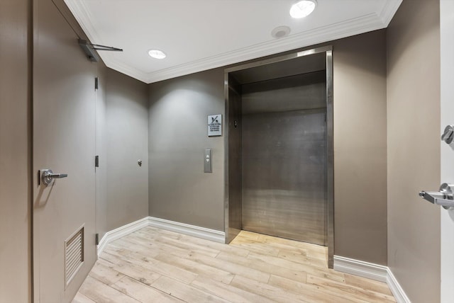 455 E Palmetto Park Rd Unit 3E, Boca Raton, FL 33432 - hallway with elevator, crown molding, light wood-style floors, and baseboards