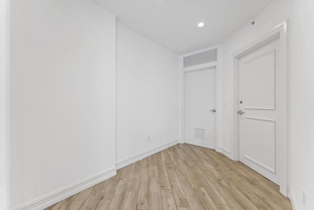 455 E Palmetto Park Rd Unit 3E, Boca Raton, FL 33432 - unfurnished bedroom with light wood finished floors, recessed lighting, and baseboards