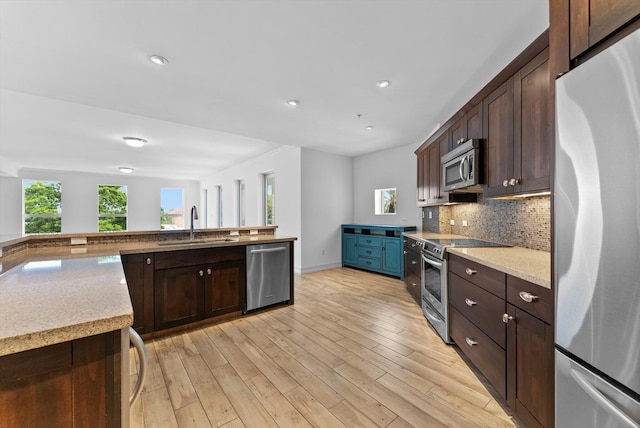 455 E Palmetto Park Rd Unit 3E, Boca Raton, FL 33432 - kitchen with appliances with stainless steel finishes, a sink, dark brown cabinets, and recessed lighting
