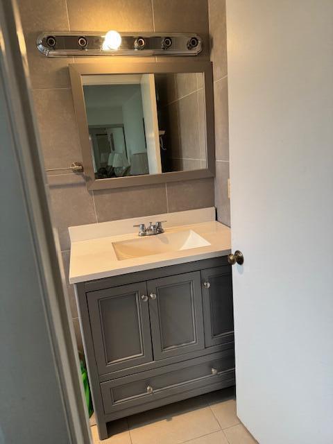 5397 Lakefront Blvd Unit A, Delray Beach, FL 33484 - bathroom featuring vanity and tile patterned floors