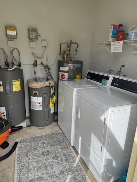 5397 Lakefront Blvd Unit A, Delray Beach, FL 33484 - washroom featuring washing machine and clothes dryer and electric water heater