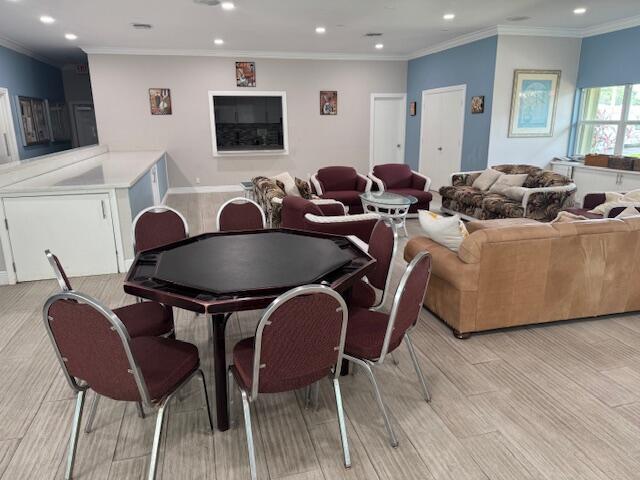 5397 Lakefront Blvd Unit A, Delray Beach, FL 33484 - dining room featuring recessed lighting, light wood finished floors, and crown molding