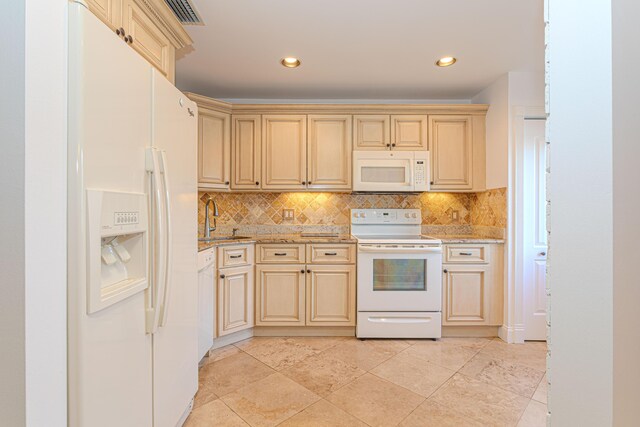 2641 Gately Dr W Unit 1003, West Palm Beach, FL 33415 - kitchen featuring white appliances, cream cabinetry, electric panel, and baseboards