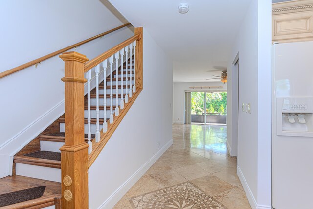 2641 Gately Dr W Unit 1003, West Palm Beach, FL 33415 - spare room featuring baseboards and a ceiling fan