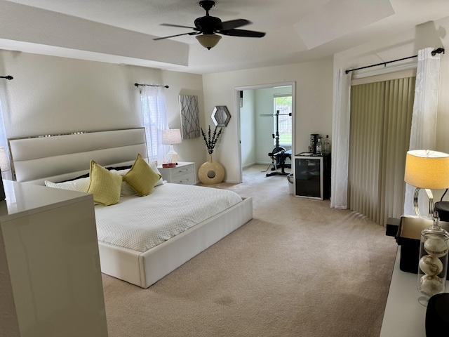 1710 SW Columbia St, Port Saint Lucie, FL 34987 - bedroom with carpet, a tray ceiling, and a ceiling fan