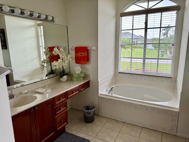 1710 SW Columbia St, Port Saint Lucie, FL 34987 - full bath with healthy amount of natural light, a garden tub, and vanity