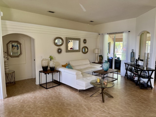 1710 SW Columbia St, Port Saint Lucie, FL 34987 - tiled living area with arched walkways