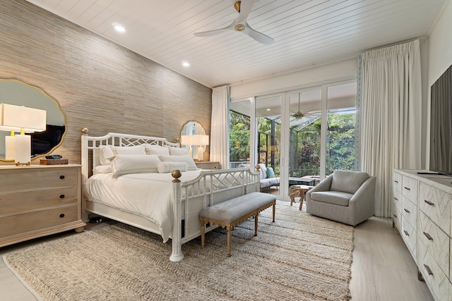 106 Henry Sewall Way, Sewalls Point, FL 34996 - bedroom with access to outside, a ceiling fan, and recessed lighting