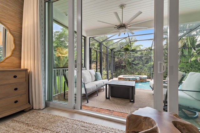106 Henry Sewall Way, Sewalls Point, FL 34996 - sunroom / solarium with ceiling fan, a hot tub, and plenty of natural light