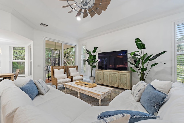 106 Henry Sewall Way, Sewalls Point, FL 34996 - living room featuring a ceiling fan, ornamental molding, and wood finished floors