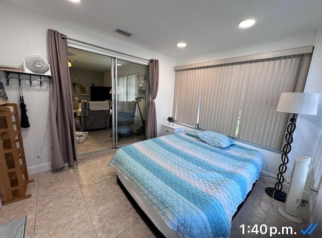 1232 W Club Dr W Unit D, Delray Beach, FL 33445 - bedroom featuring recessed lighting, tile patterned floors, and a closet
