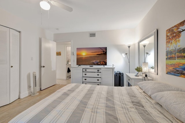 1232 W Club Dr W Unit D, Delray Beach, FL 33445 - bedroom featuring wood finished floors, ceiling fan, a closet, and baseboards