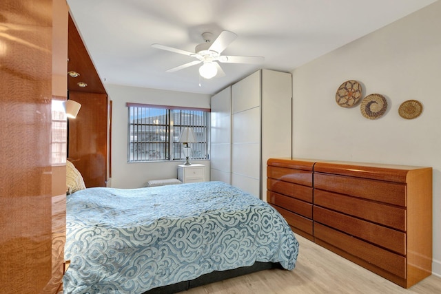 1232 W Club Dr W Unit D, Delray Beach, FL 33445 - bedroom featuring wood finished floors and a ceiling fan