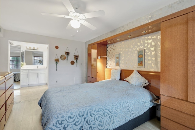 1232 W Club Dr W Unit D, Delray Beach, FL 33445 - bedroom featuring wallpapered walls and a ceiling fan