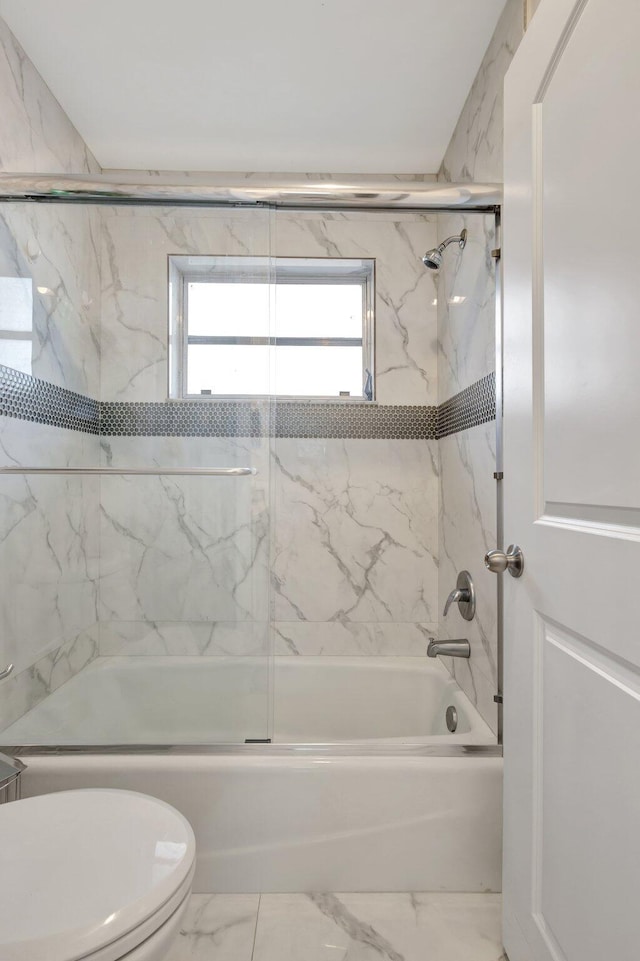 1232 W Club Dr W Unit D, Delray Beach, FL 33445 - bathroom featuring toilet, combined bath / shower with glass door, and marble look tile flooring