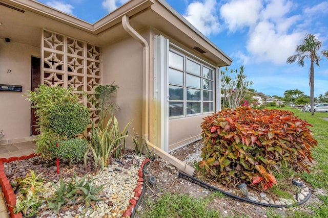 1232 W Club Dr W Unit D, Delray Beach, FL 33445 - view of home's exterior with stucco siding
