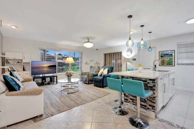 1232 W Club Dr W Unit D, Delray Beach, FL 33445 - living area with light tile patterned floors and baseboards