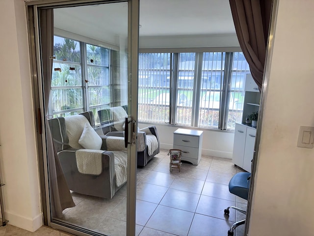 1232 W Club Dr W Unit D, Delray Beach, FL 33445 - living room featuring plenty of natural light and light tile patterned floors