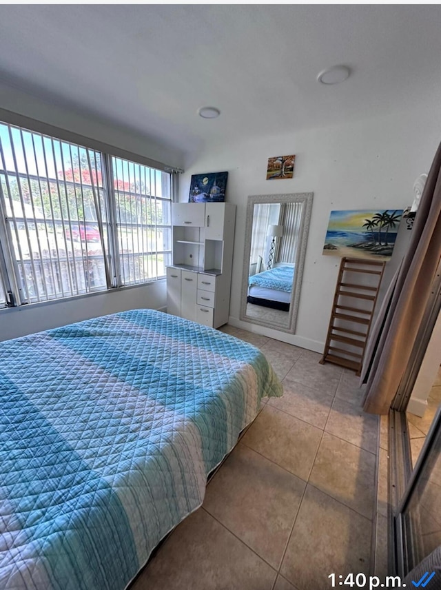 1232 W Club Dr W Unit D, Delray Beach, FL 33445 - bedroom with light tile patterned flooring