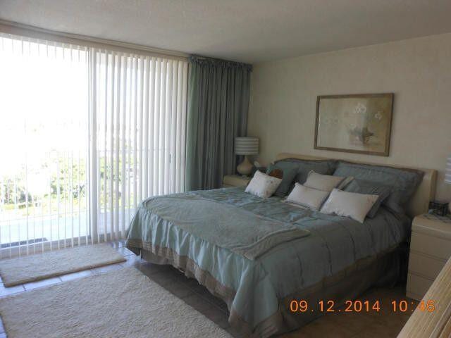 4200 S Ocean Blvd Unit 503, South Palm Beach, FL 33480 - bedroom with multiple windows