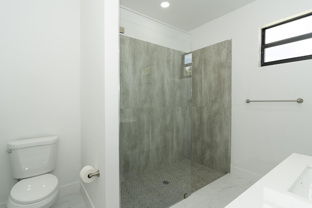 3810 29th St SW, Lehigh Acres, FL 33976 - full bathroom with toilet, marble look tiles, walk in shower, and baseboards