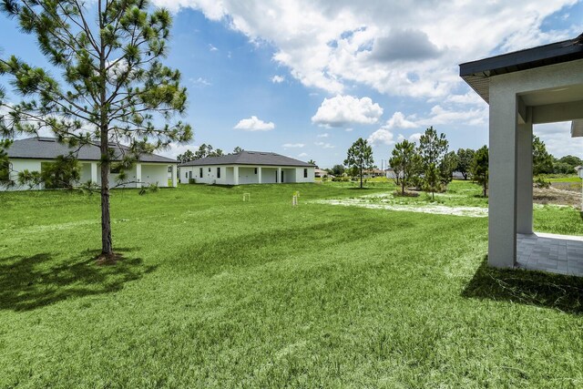 3810 29th St SW, Lehigh Acres, FL 33976 - view of green lawn
