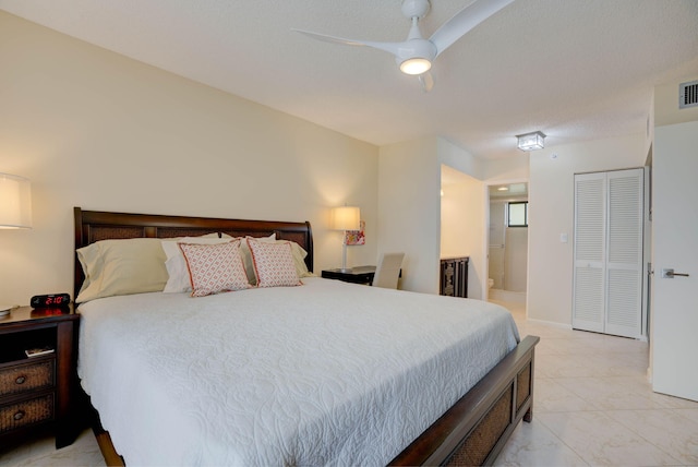 400 Ocean Trail Way Unit 707, Jupiter, FL 33477 - bedroom with ensuite bathroom and a ceiling fan