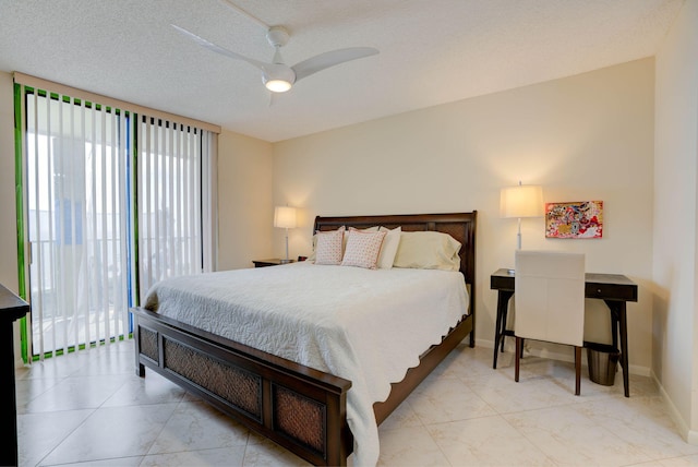 400 Ocean Trail Way Unit 707, Jupiter, FL 33477 - bedroom with multiple windows, light marble finish flooring, and baseboards