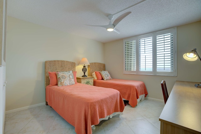 400 Ocean Trail Way Unit 707, Jupiter, FL 33477 - bedroom with a textured ceiling, ceiling fan, and baseboards
