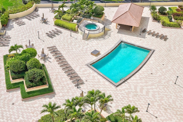 400 Ocean Trail Way Unit 707, Jupiter, FL 33477 - community pool with a patio and a community hot tub