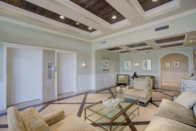 400 Ocean Trail Way Unit 707, Jupiter, FL 33477 - living room featuring inlaid floor details, crown molding, beamed ceiling, coffered ceiling, and a decorative wall
