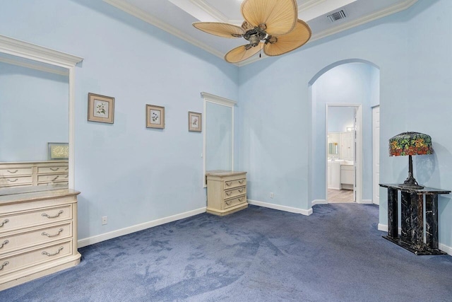 8351 Mastic Cay, West Palm Beach, FL 33411 - unfurnished bedroom featuring arched walkways, ornamental molding, dark carpet, baseboards, and ensuite bath