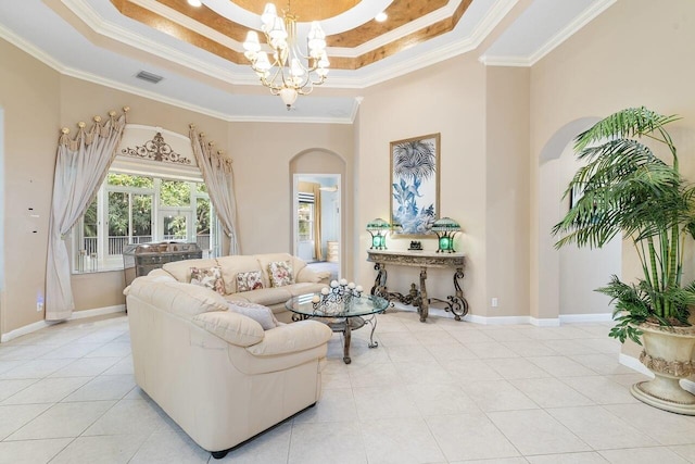 8351 Mastic Cay, West Palm Beach, FL 33411 - living room with a raised ceiling, arched walkways, a chandelier, ornamental molding, and light tile patterned flooring
