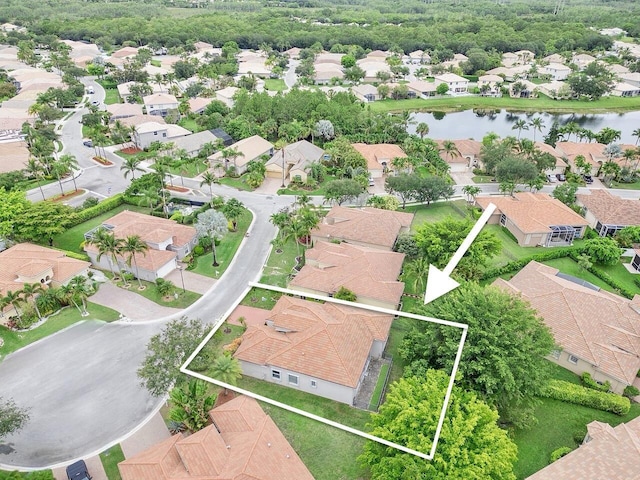 8351 Mastic Cay, West Palm Beach, FL 33411 - aerial perspective of suburban area featuring a nearby body of water and property boundaries highlighted