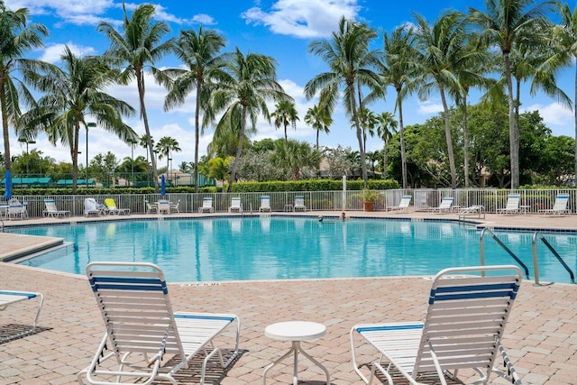 8351 Mastic Cay, West Palm Beach, FL 33411 - community pool with a patio area
