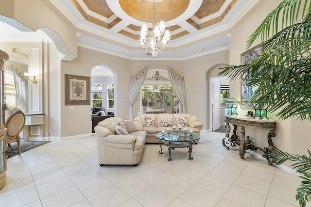 8351 Mastic Cay, West Palm Beach, FL 33411 - living area with a chandelier, arched walkways, ornamental molding, light tile patterned flooring, and baseboards